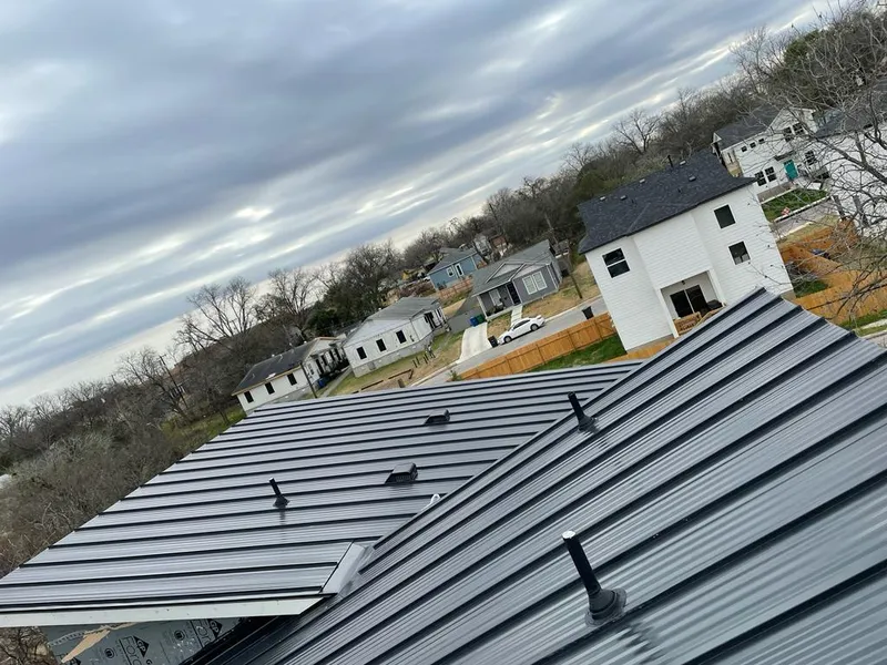 Standing seam metal roof panels with vents for Skylight Repair in Williams